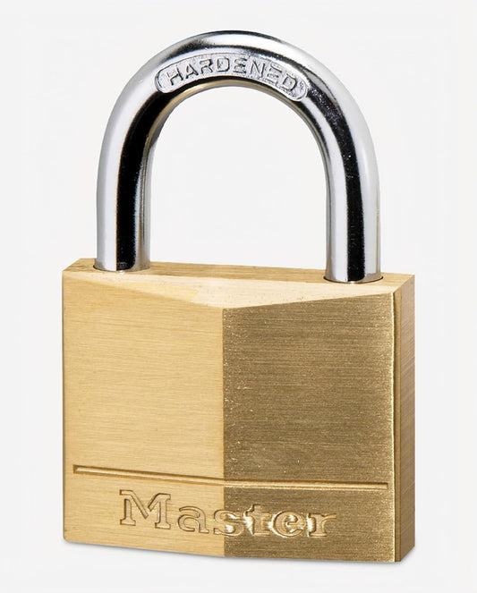 A Master brand padlock with a brushed brass body and a polished chrome shackle, shown on a light gray background. The brand 'Master' is embossed on the bottom of the lock body, and 'HARDENED' is stamped on the shackle.